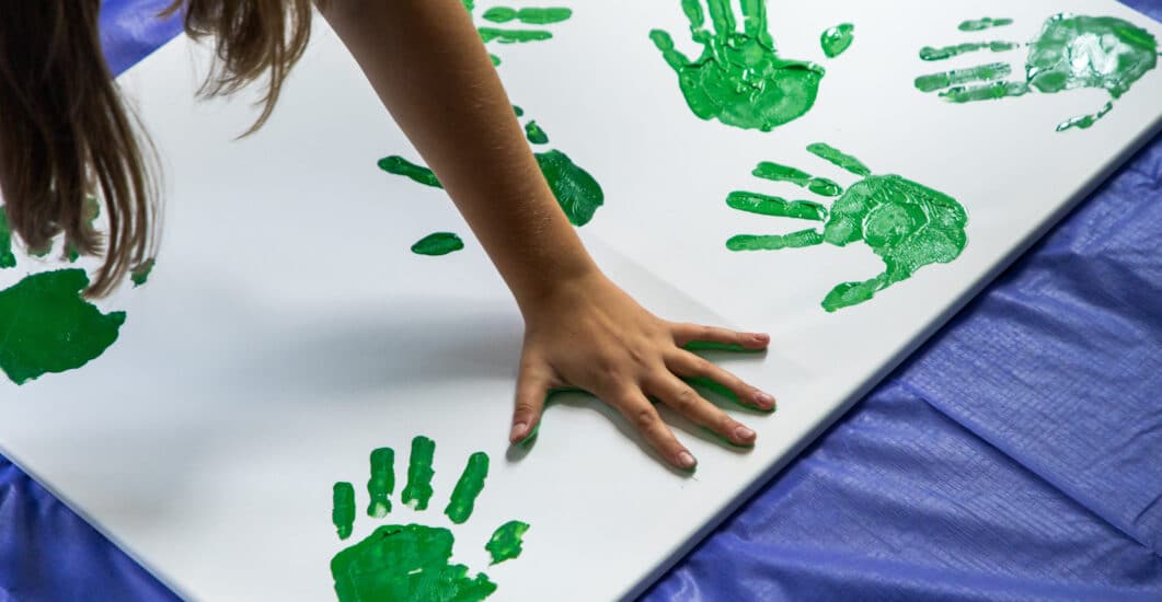A photograph of pupils from Hurstpierpoint College engaging in a Belonging activity.